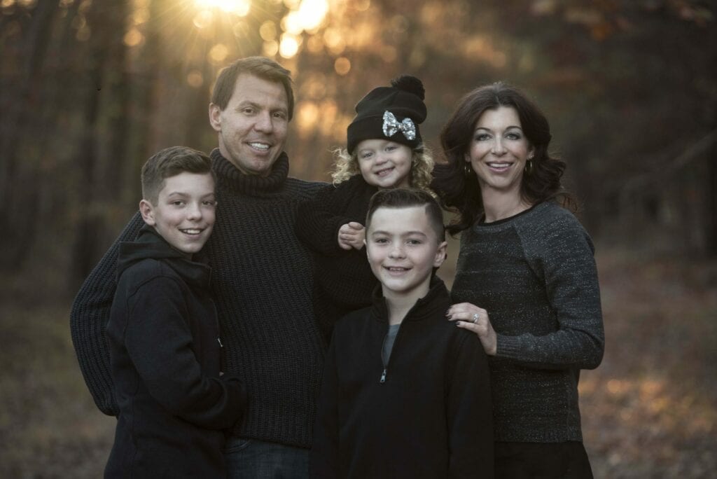 family photography portrait in nature all bundled up